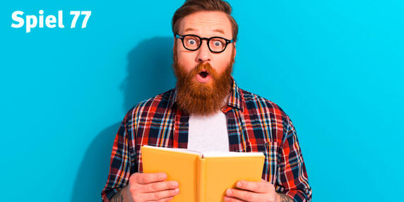 Man reading with surprised expression